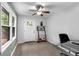 Bright office space with hardwood floors and a large window at 3656 Ebenezer Rd, Marietta, GA 30066