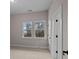Bedroom with two windows and light-colored walls, creates a bright and airy ambiance at 4770 Briscoe Dr, Cumming, GA 30028