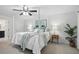Spacious bedroom with a ceiling fan and a four post bed at 4824 Dunwoody Station Dr, Atlanta, GA 30338