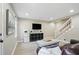 Spacious living room with stairs, hardwood floors, and bright natural light at 4824 Dunwoody Station Dr, Atlanta, GA 30338