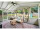 Inviting sunroom with a comfortable seating area, perfect for relaxing and enjoying the view at 4824 Dunwoody Station Dr, Atlanta, GA 30338