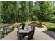 Relaxing back porch overlooking a lush backyard, great for outdoor seating and entertaining at 17 Shotgun Nw Rd, Cartersville, GA 30121