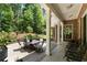 Relaxing back porch overlooking a lush backyard, great for outdoor seating and entertaining at 17 Shotgun Nw Rd, Cartersville, GA 30121