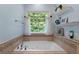 Bathroom featuring a large tub and decorative tile at 17 Shotgun Nw Rd, Cartersville, GA 30121
