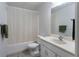 Bathroom featuring a shower and bath with modern fixtures and a large mirror at 17 Shotgun Nw Rd, Cartersville, GA 30121