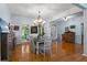 Light-filled dining room featuring hardwood floors, neutral wall tones, and elegant decor at 17 Shotgun Nw Rd, Cartersville, GA 30121