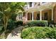 Inviting front porch area with classic columns and comfortable seating amid verdant landscaping at 17 Shotgun Nw Rd, Cartersville, GA 30121
