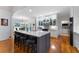 Modern kitchen features an island with seating, pendant lighting, and hardwood flooring for a warm, inviting space at 17 Shotgun Nw Rd, Cartersville, GA 30121