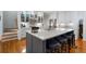 Updated kitchen offers a large island with seating and ample cabinet space, perfect for cooking and entertaining at 17 Shotgun Nw Rd, Cartersville, GA 30121