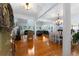Spacious living area with hardwood floors, natural light, and open floor plan seamlessly integrating living spaces at 17 Shotgun Nw Rd, Cartersville, GA 30121