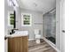 Bathroom featuring a shower and a wooden vanity at 2089 Christian Se Cir, Conyers, GA 30013
