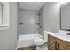 Bathroom featuring tile shower and wooden vanity at 2089 Christian Se Cir, Conyers, GA 30013