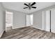 This bedroom features a bathroom view, closet and luxury vinyl flooring at 2089 Christian Se Cir, Conyers, GA 30013