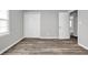 Bedroom with modern floors, large closet, and ample natural light at 2089 Christian Se Cir, Conyers, GA 30013