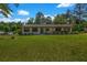 Charming single-story home featuring a manicured lawn, beautiful shutters, and a freshly painted exterior at 2089 Christian Se Cir, Conyers, GA 30013