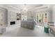 A serene main bedroom features a canopy bed, fireplace, built-in shelving, and ample natural light, creating a peaceful retreat at 2878 Wesley Heath Nw, Atlanta, GA 30327