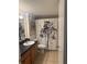 Bathroom with tree-themed shower curtain and wood vanity at 3120 Seven Pines Court # 203, Atlanta, GA 30339