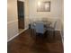 Dining area featuring a modern round table and seating for four at 3120 Seven Pines Court # 203, Atlanta, GA 30339