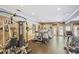 Community gym with modern exercise equipment, mirrored wall, and ample space for workouts at 3120 Seven Pines Court # 203, Atlanta, GA 30339