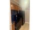 Efficient kitchen layout with black appliances and light wood cabinets at 3120 Seven Pines Court # 203, Atlanta, GA 30339