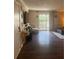 Bright living room with wood floors and sliding doors to the balcony at 3120 Seven Pines Court # 203, Atlanta, GA 30339