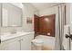 Bathroom with white vanity, tub, and shower with brown tile surround at 588 Benson Hurst Dr, Mableton, GA 30126