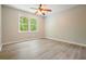 Bedroom with large window overlooking the backyard, providing plenty of natural light at 588 Benson Hurst Dr, Mableton, GA 30126