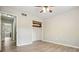 Neutrally decorated bedroom featuring closet and entryway with light wood flooring at 588 Benson Hurst Dr, Mableton, GA 30126