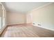 Inviting living room with natural light and hardwood floors, creating a warm atmosphere at 588 Benson Hurst Dr, Mableton, GA 30126