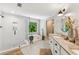 Luxurious bathroom featuring a walk-in shower, soaking tub, double vanity, and stylish finishes at 7235 Compton Cir, Cumming, GA 30040