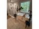 Serene bathroom with a soaking tub, glass-enclosed shower, and nature view at 7235 Compton Cir, Cumming, GA 30040