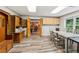 Bright bonus room with hardwood floors and storage cabinets is perfect for crafting or hobbies at 7235 Compton Cir, Cumming, GA 30040