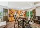 A beautiful dining area with wood accents, a bar area, and natural light at 7235 Compton Cir, Cumming, GA 30040
