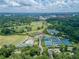 Aerial view featuring Bitsy Grant Tennis Center, golf course, and city skyline in the background at 115 Biscayne Nw Dr # F1, Atlanta, GA 30309
