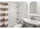 Cozy bathroom with shower-tub combo and sink at 115 Biscayne Nw Dr # F1, Atlanta, GA 30309
