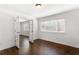 Spacious room featuring beautiful hardwood floors and natural light, perfect for a bedroom or office at 115 Biscayne Nw Dr # F1, Atlanta, GA 30309