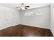 Bedroom featuring ceiling fan, hardwood floors, closet and natural lighting at 115 Biscayne Nw Dr # F1, Atlanta, GA 30309