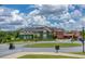 Clubhouse with lush landscaping and golf course views, perfect for community gatherings at 115 Biscayne Nw Dr # F1, Atlanta, GA 30309