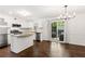 Updated kitchen featuring stainless steel appliances, granite countertops, and an adjacent dining area at 115 Biscayne Nw Dr # F1, Atlanta, GA 30309