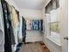 Walk-in closet offering ample storage space with a variety of clothing and shoe storage at 2860 Cooper Brook Dr, Snellville, GA 30078