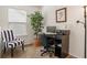 Cozy home office featuring a desk, chair, and a view from a window at 2860 Cooper Brook Dr, Snellville, GA 30078