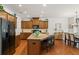 Spacious kitchen with granite countertops, an island, and stainless steel appliances at 2860 Cooper Brook Dr, Snellville, GA 30078