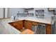 Basement bar area with custom shelving, a sink, and a beverage cooler at 4000 Mcpherson Drive Dr, Acworth, GA 30101