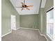Large bedroom featuring a ceiling fan and plenty of natural light, creating a comfortable and inviting space at 4000 Mcpherson Drive Dr, Acworth, GA 30101