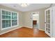 Bright dining area with bamboo floors, showcasing natural light from the windows for a cozy and inviting atmosphere at 4000 Mcpherson Drive Dr, Acworth, GA 30101