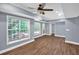 Bright living room features a ceiling fan and windows providing beautiful views of the outdoors at 4000 Mcpherson Drive Dr, Acworth, GA 30101