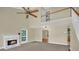 Bright and airy living room with high ceilings, fireplace, and view of the upper-level landing at 4000 Mcpherson Drive Dr, Acworth, GA 30101