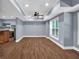 Spacious living room with wood floors, recessed lights, and large windows at 4000 Mcpherson Drive Dr, Acworth, GA 30101