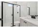 Modern bathroom featuring a glass-enclosed shower, sleek vanity, and contemporary fixtures for a luxurious feel at 4480 Beechnut Cir, Cumming, GA 30028