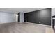 Spacious living room featuring a modern fireplace, new floors, and an open floor plan at 47 Arbor End, Smyrna, GA 30080